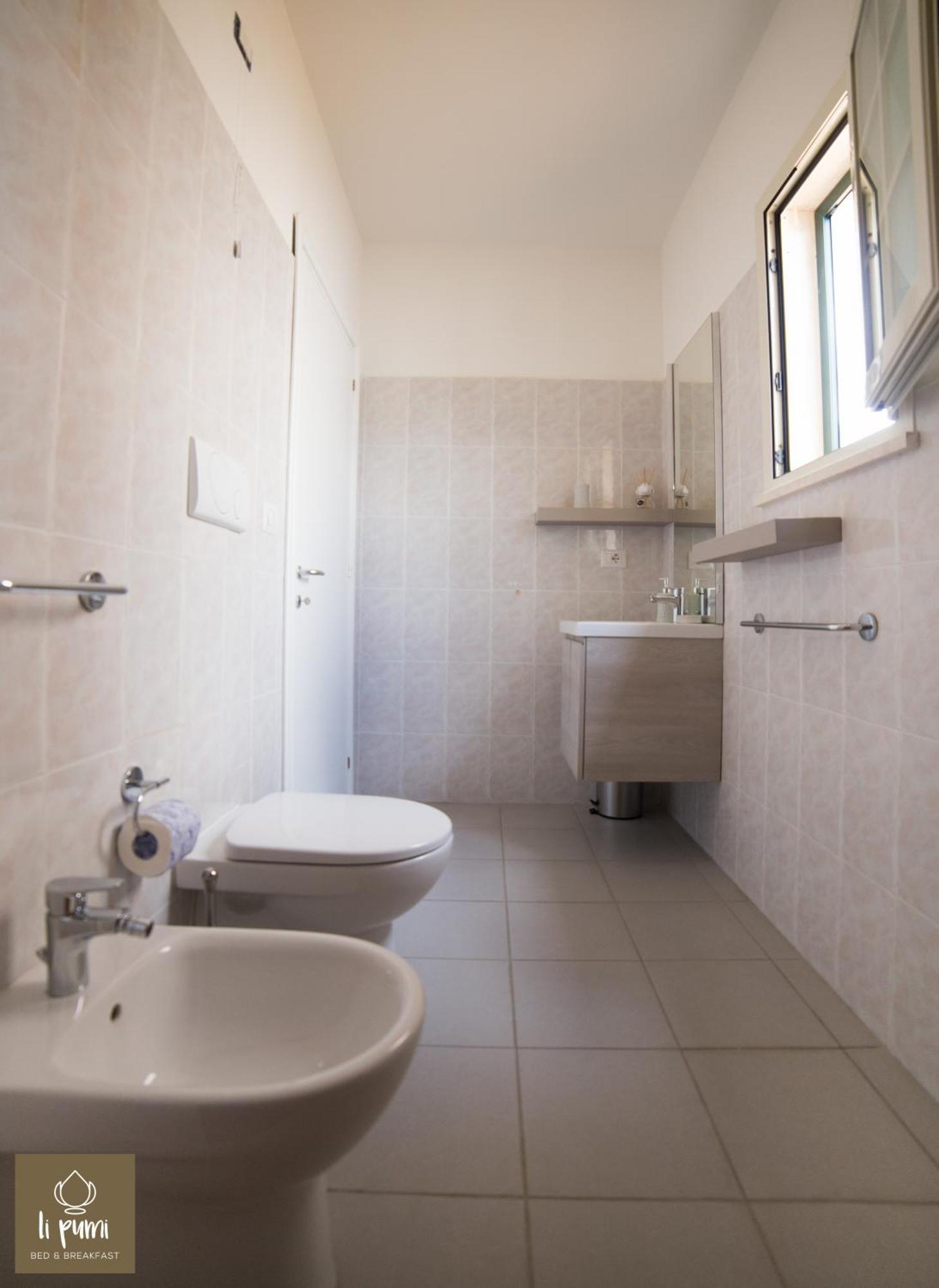 Bed and Breakfast Li Pumi Alliste Zimmer foto