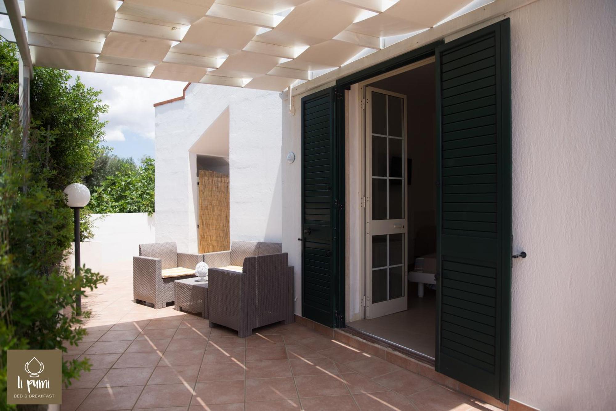 Bed and Breakfast Li Pumi Alliste Zimmer foto